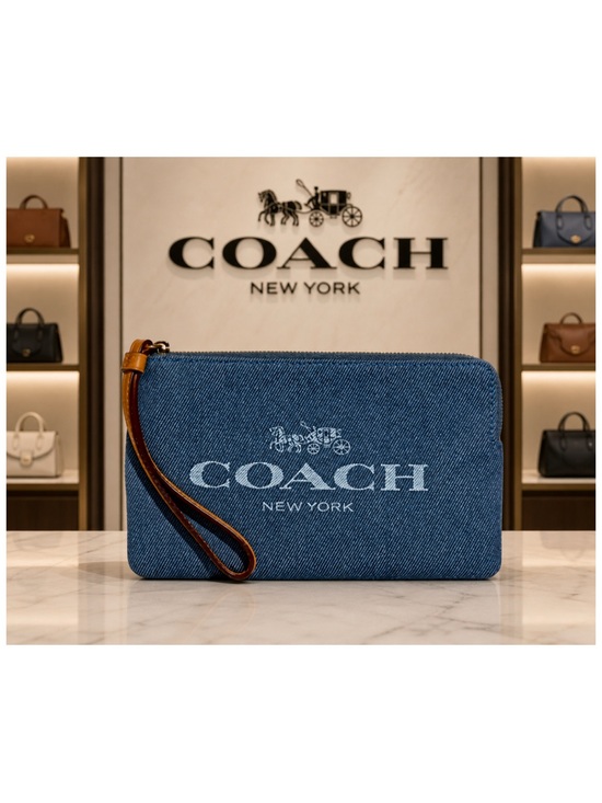 Coach Handbags - Coach Denim and Leather Large Signature Corner Zip Wristlet.